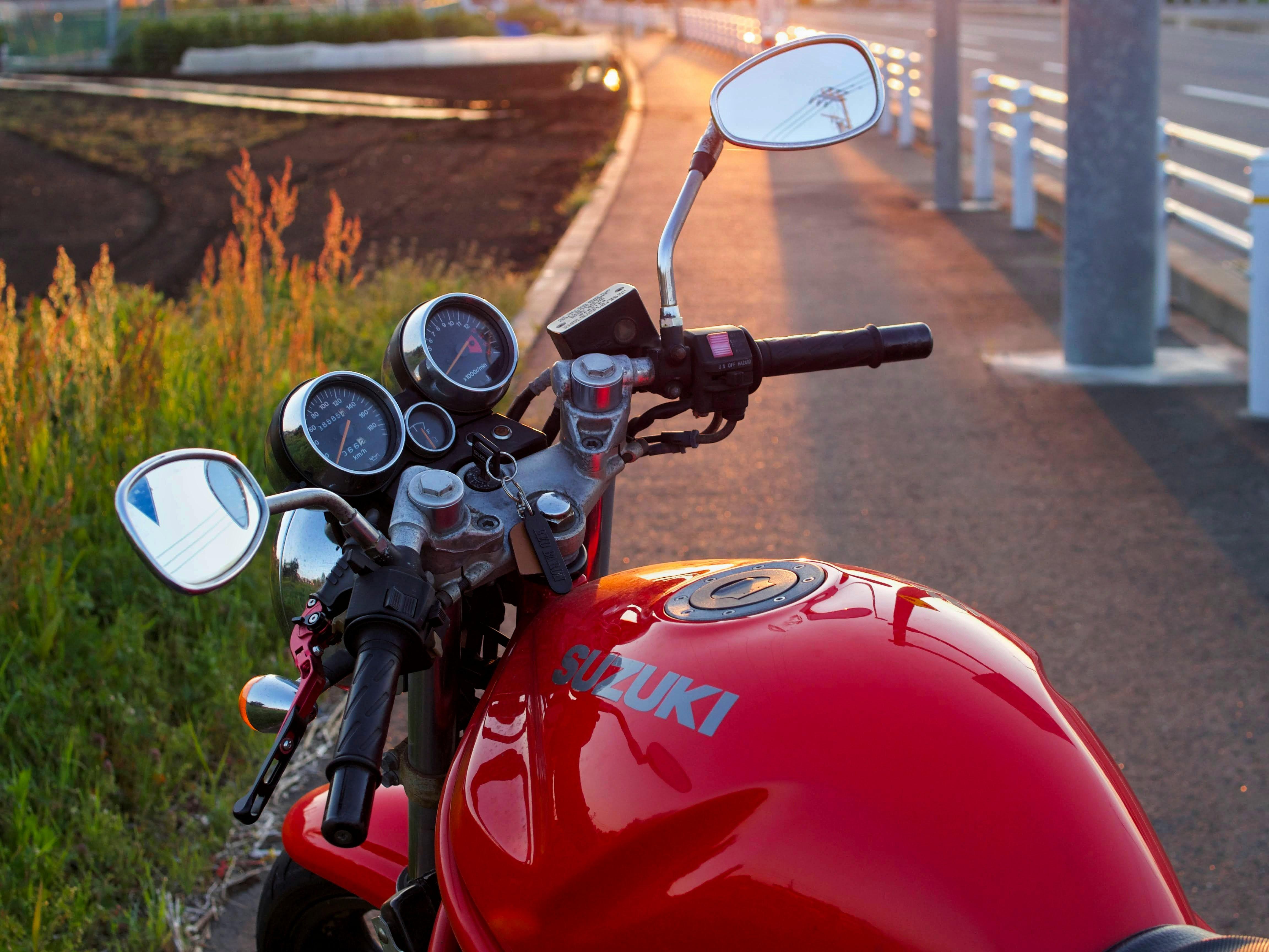 Riders preparing motorcycles before group ride